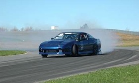 Exotics and new cars out for a (tire) spin at Monticello. (Photo courtesy of AutoWeek.)