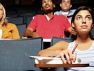 Image: Student in classroom (© StockByte/PictureQuest)
