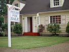 Sold home: Image: Real estate sign indicating sold house (© Ryan McVay/Digital Vision/Getty Images)