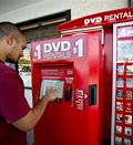 Credit: (© Damian Dovarganes/AP)
Caption: File photo of man renting a DVD movie at a Redbox