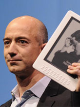 Credit: EMMANUEL DUNAND/AFP/Getty Images
Caption: Online retail giant Amazon.com CEO Jeff Bezos unveils the Kindle DX
