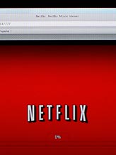 Credit: (© James H. Collins/AP)
Caption: A Netflix movie begins to download on a home computer screen