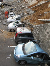 Caption: Vehicles are crushed by a collapsed wall at a carpark in Mito city in Ibaraki prefecture on March 11, 2011 after a massive earthquake rocked Japan
Credit: JIJI/PRESS/AFP/Getty Images
