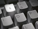Image: Dollar sign on keyboard (Â© Corbis)
