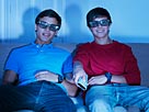 Image: Teenage boys watching television with 3-D glasses Â© Robert Daly/OJO Images/Getty Images