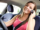 Image: Driver on cell phone (© BananaStock/Jupiterimages)