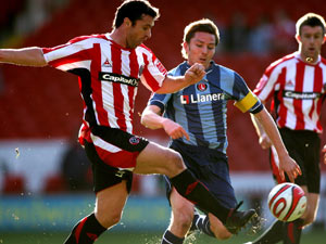 Challenging Gary for possession for Charlton against Sheffield United in 2008