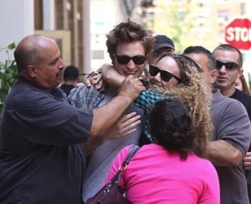 Robert accosted by a rude fan