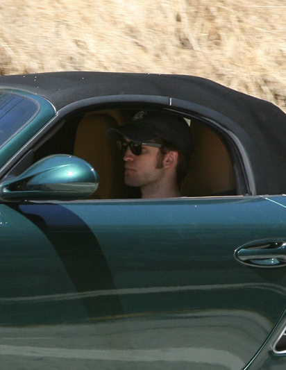 Rob driving a new Porsche