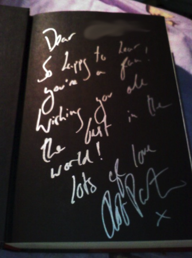 Rob signed a book