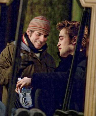 Chris Weitz and Rob on the set of "New Moon"